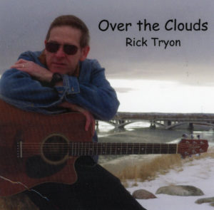 Rick Tryon releases Over the Clouds -- a compilation of originals and favorites. 
