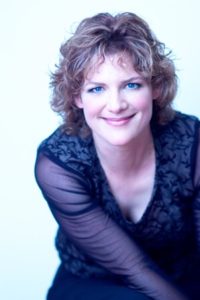 Twin City pianist Laura Caviani has performed and recorded for over 15 years. 