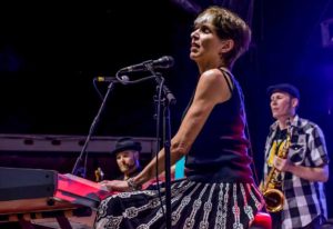 Marcia Ball and her saxophonist, Eric Bernhardt, perform in Big Timber. The New York Times says, “Marcia Ball plays two-fisted New Orleans barrelhouse piano and sings in a husky, knowing voice about all the trouble men and women can get into on the way to a good time.” 
