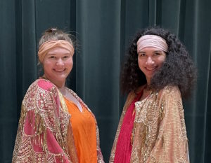 Ally Randolph as Fiordiligi and Cheyenne Brown as Dorabella portray two easily duped sisters in Mozart's Così fan tutte.