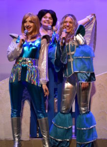 "Mamma Mia!" revisits the songs and styles of the 1970s with music by ABBA. The cast includes Delanie Kinney, Abbigail Aldridge, Savannah DeCrow.
