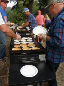Swan Lake Huckleberry Festival opens with pancake breakfast. 