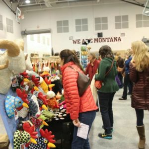 Shoppers peruse wares at the Missoula MADE fair, which fills all three floors of the Adams Center. 