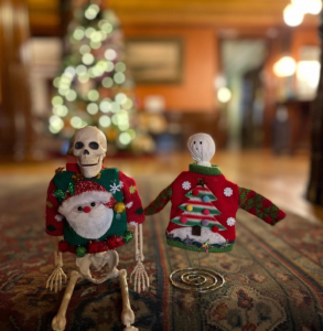 Gideon and Sal, attired in holiday sweaters, were busy touring the Moss Mansion's Christmas tree display. 