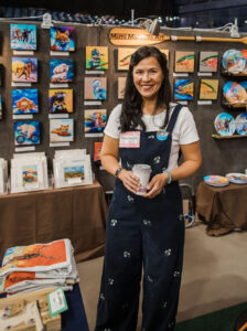 Bozeman artist Mimi Matsuda shares her Mimi Matsuda Art, whimsical paintings of wildlife and landscapes at MADE fairs this holiday season. 