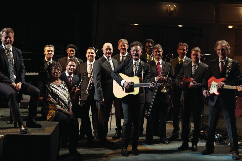 Lyle Lovett and His Large Band step on stage July 13