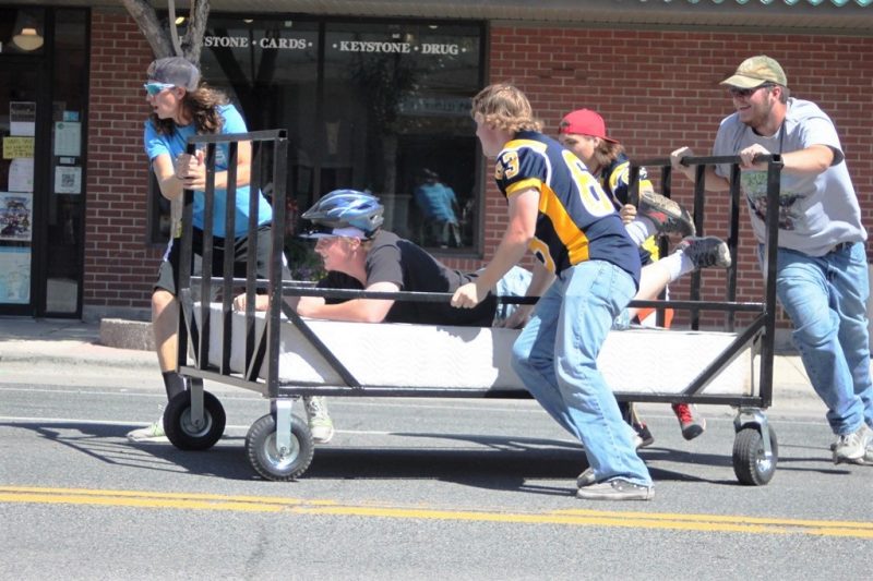 PCHS football players sped through a serpentine of cones to win the bed races.