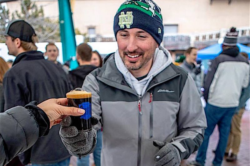 Happy customer at last year's Winter BrewFest in Caras Park. 
