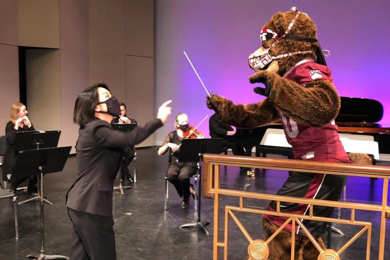Music Director Julia Tai gives Monte directing tips in preparation for the Missoula Symphony's upcoming family concert.