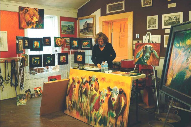 Renowned artist Diane Whitehead at the Brand Bar Museum in Ovando, a stop on the Tour of the Arts.