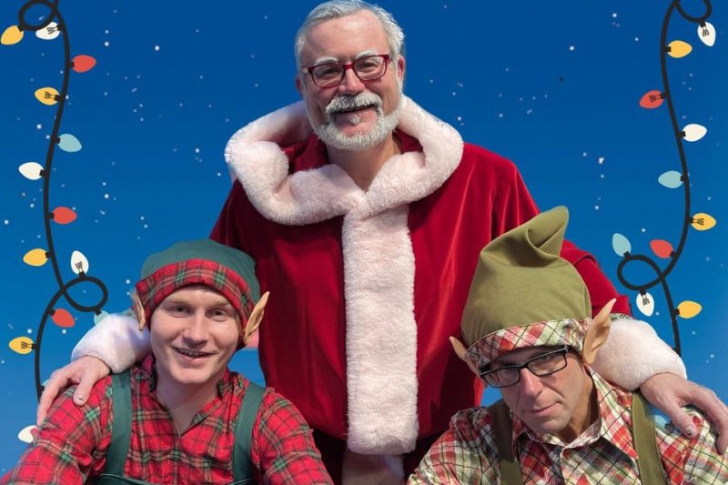 Eubie the Happy Elf (Kelson Bauman), with Santa (Dylan Wright) and Norbert (Stu Kaplan).