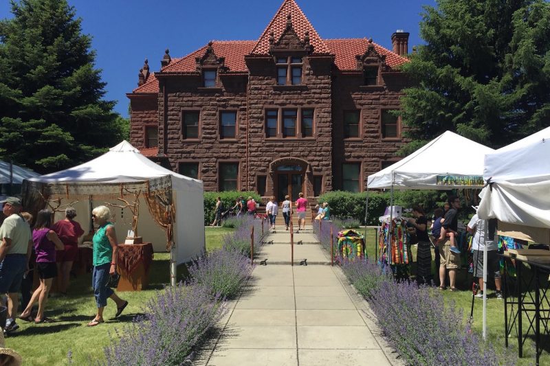 Vendors line the walk to the historic Moss Mansion in Billings during SpringFest.