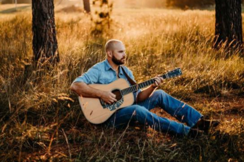 Singer, songwriter, and guitarist Dalton Harper brings energetic instrumentation and dynamic vocals to the 2024 Miles City Bluegrass Festival.